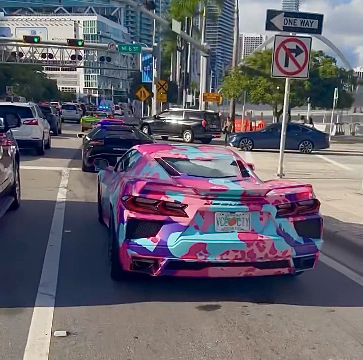 GTASixInfo's tweet photo. Rockstar appears to be bringing GTA 6’s cars into the real world for its Miami marketing.

A real-life Coquette has been spotted driving with a Vice City style wrap and Leonida license plate, alongside a Lamborghini wrapped in Vice Beach Police livery.

(via IG/andrewblakeames) https://t.co/Zyq3q2ndfP
