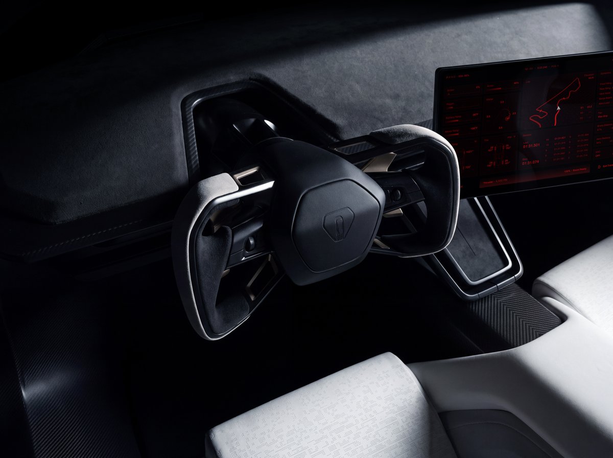 Tesla's tweet photo. Interior
– Ultrawhite interior w/ gray microsuede detailing & seat bolsters for added grip

– Manual controls & a fixed seat position reduce overall vehicle mass

– Lightweight, high-strength materials throughout, including magnesium, titanium & carbon fiber help reduce it further

This allows Roadster to respond to driver inputs almost instantly