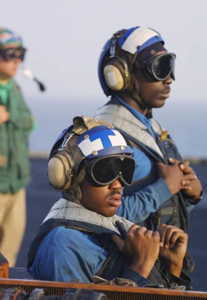 25YearsAgoLive's tweet photo. Sunrise in the Indian Ocean: American fighter jets rally aboard the USS Enterprise for another day of strikes on Afghanistan. https://t.co/idx9bMtsJB