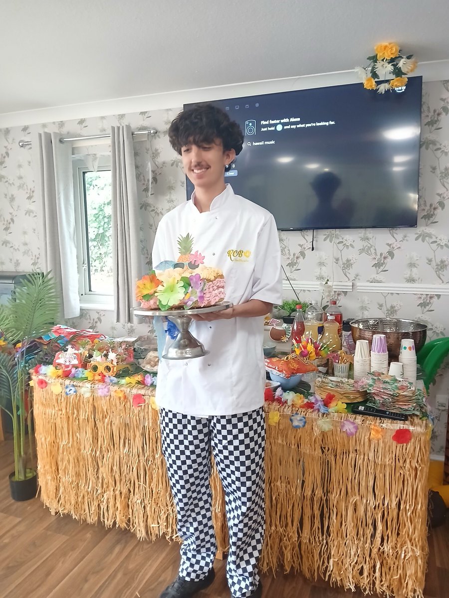 Forward2Employ's tweet photo. Supported Intern Luca prepared a Hawaiian Day-themed cake for residents at Priory Mews Care Home, part of RCB Healthcare Group!

Luca took charge of the baking and iced a cake for the very first time!

Well done Luca, keep up the good work! https://t.co/DCyLMQtDjr
