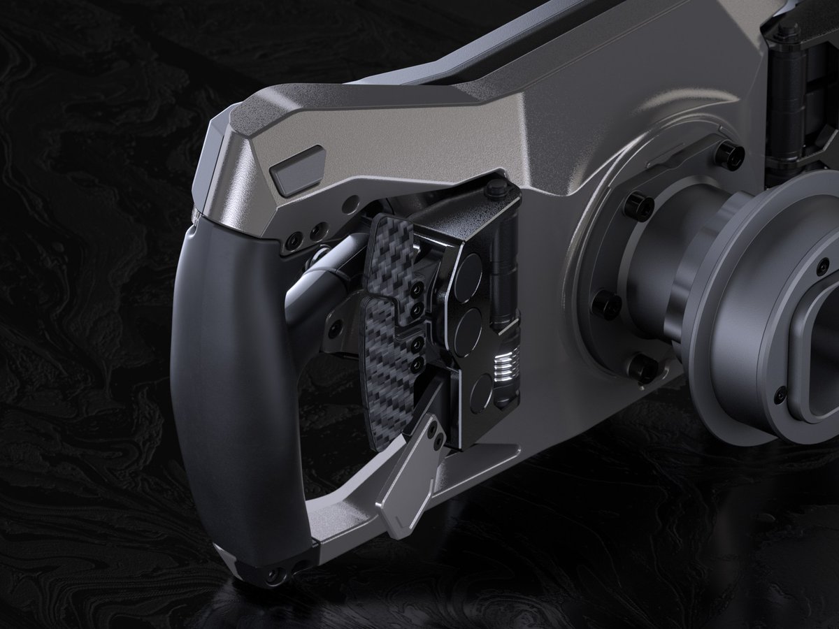 DigitRacing's tweet photo. Fanatec Project Obsidian is a new steering wheel with a 5-inch colour display, SimHub support and console telemetry over Wi-Fi, coming in 2027 at ClubSport-level pricing. Fanatec is showing the prototype at SimRacing Expo Frankfurt 2026.

https://t.co/qg7WZbfZ2X https://t.co/YKrGEpDCBV