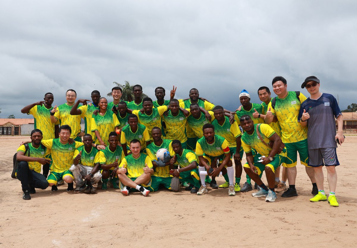 COSCOSHIPPING's tweet photo. And the MVP goes to… TEAM SPIRIT! 🏆⚽

COSCO SHIPPING brought Chinese and Guinean colleagues together for their first football friendly, followed by an evening celebration marking both countries’ national holidays.

🏟️ Venue: A primary school pitch in Guinea
⚔️ Fixture: Team Yellow 🆚 Team Blue
🌍 Squad: China + Guinea
🏆 Stakes: Bragging rights & unforgettable memories

The crowd showed up. The commentators brought the energy. The players brought their A-game. Even the rain wanted a piece of the action! 🌧️😂

And after the final whistle? Straight into the celebration. 🎶🕺
Different flags. Same team spirit. One unforgettable match.

#COSCOSHIPPING #SailingTogether #MatchDay #Football #TeamSpirit