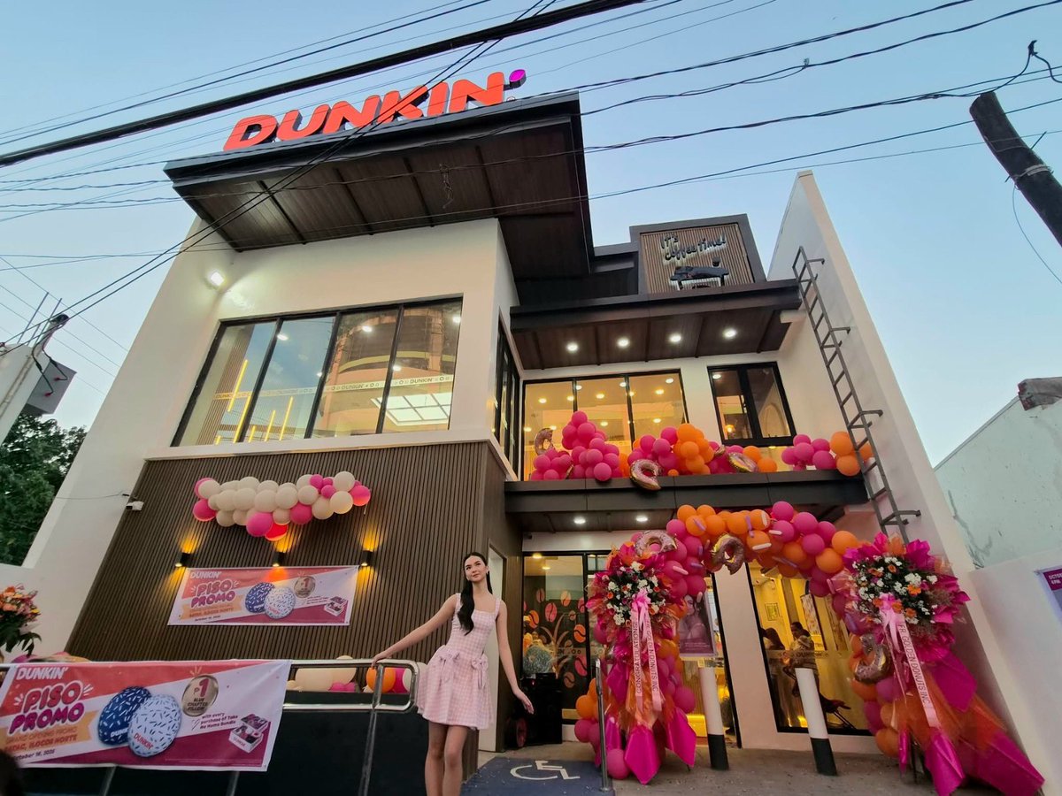 dunkinph's tweet photo. Kai Montinola graced the opening of Dunkin’ Batac in Ilocos with her charm, making the day extra sweet! 🧡✨ Thank you Ilocos for the love. #DunkinPH https://t.co/wJFxdQcH6h