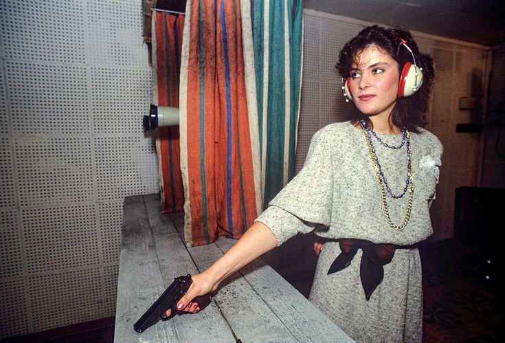eastblocvisuals's tweet photo. Yekaterina Mayorova, winner of the KGB beauty pageant at a shooting range in Moscow, 1990. https://t.co/xe44rjykqj