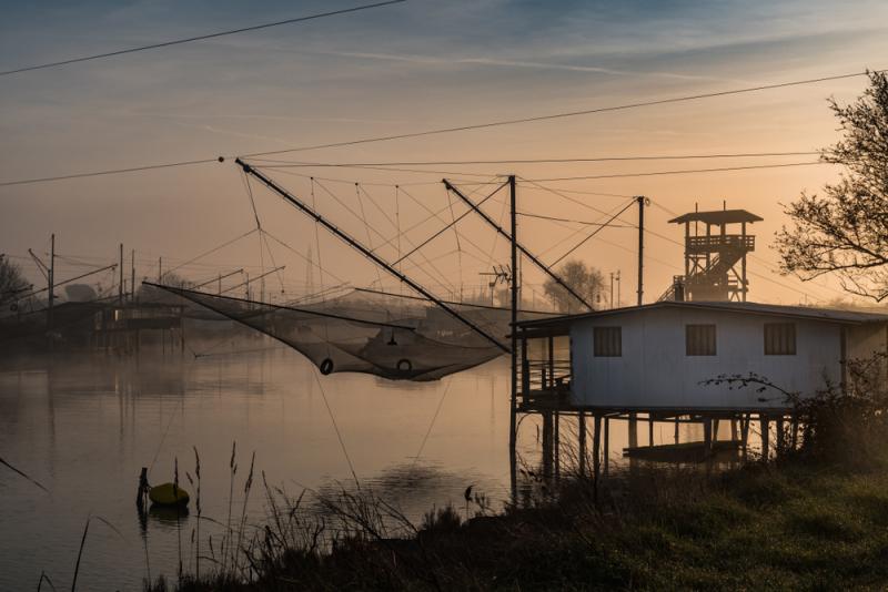 ItalyMagazine's tweet photo. This misty landscape steeped in eel fishing tradition forms a moody regional park that attracts only the most intrepid travelers: https://t.co/5VWBMohDs0 https://t.co/ow9EcXC739