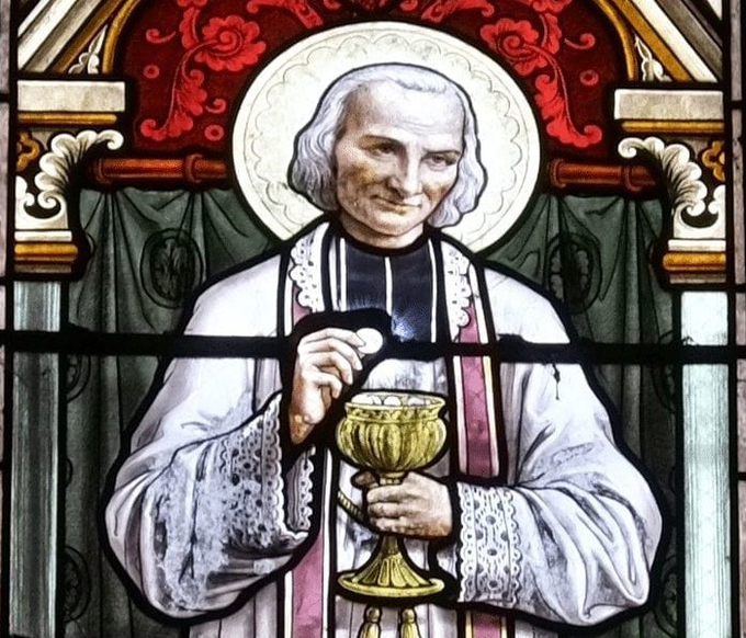 trad_west_'s tweet photo. The context of the French Revolution had a strong influence on his youth: he made his first confession at the foot of the great clock, in the common room of the house where he was born, rather than in the village church, and received absolution from an underground priest.

Two years later, he made his First Communion in a barn, during an underground mass celebrated by a refractory priest. 

At 17, he chose to answer God’s call: “I’d like to win souls for God,” he told his mother, Marie Béluze. But his father opposed the project for two years, as there was a shortage of hands at his father’s house.

Once in the seminary everyone thought he was too stupid to be a priest.

He couldn’t read, struggled with Latin, and was nearly kicked out of seminary.

But God had other plans.

After years of struggle and private tutoring, Jean was finally ordained at age 29.

He was sent to a forgotten village in rural France.
A tiny, desolate place called Ars.

The bishop said: “There is little love of God in that parish, you will bring it there.”

There, he awakened the faith of his parishioners through his preaching, but above all through his prayer and his way of life. 

He feels poor in front of the mission to be accomplished, but he lets himself be seized by God’s mercy. 

He restored and embellished his church, founded an orphanage: “La Providence” and took care of the poorest.

By 1824, however, he began experiencing what he believed were attacks from the Devil.

At first, he suspected burglars. But the disturbances continued, and other people began witnessing strange events.

What followed would become one of the most remarkable accounts of spiritual warfare in the life of a Catholic saint.

The disturbances reportedly began with violent banging on the rectory doors, strange voices, and noises resembling heavy carts rolling through the house.

One night, Vianney asked a local wheelwright named André Verchère to stay with him, believing someone might be trying to break in.

Shortly after midnight, the house shook violently. André grabbed his gun and searched for an intruder, but found nobody.

He was so frightened that he refused to spend another night there.

On another occasion, while Vianney was staying with fellow priests during a mission at Saint-Trivier, they heard a tremendous disturbance coming from his bedroom.

Rushing inside, they reportedly discovered that his bed had been dragged into the middle of the room.

His own sister, Marguerite, also testified about hearing unexplained knocking while staying at the rectory.

Vianney called his tormentor "le Grappin," roughly meaning "the grappling hook."

According to accounts of his life, he reported being pulled by the feet, hearing mocking voices, and suffering nights of interrupted sleep.

Yet something fascinated him.

He noticed that especially violent disturbances often preceded the arrival of someone seeking reconciliation with God.

He began describing these penitents as "big fish."

The reason was simple: people who had spent years away from the Church were arriving in Ars to confess their sins and change their lives.

Vianney believed the Devil was trying to exhaust and frighten him because of his ministry.

But the attacks did not persuade him to abandon the confessional.

Instead, he continued praying, fasting, offering Mass, and hearing Confessions.

At the height of his ministry, he spent as many as 16 hours a day reconciling sinners with God. 

(2/3)