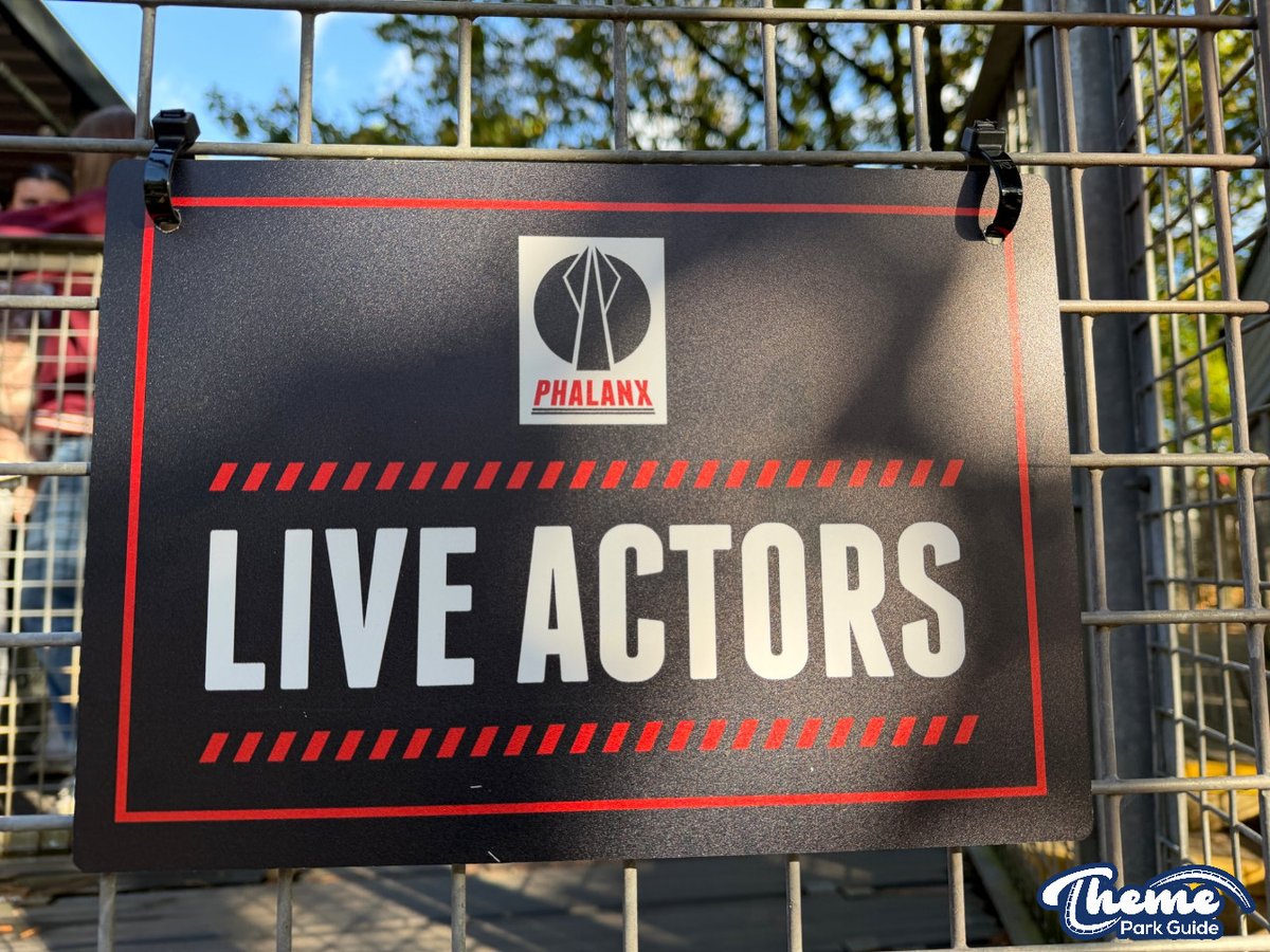 ThemeParkGuide's tweet photo. At Nemesis Sub Terra, signs saying the ride has live actors have been put on the fences.

#Nemesis #AltonTowers https://t.co/yFdQKFUtHk