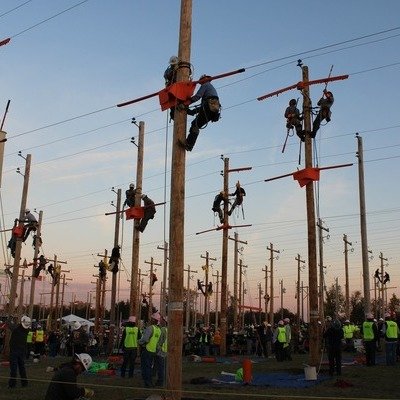 core77's tweet photo. In a fairground in Kansas this week, a number of utility poles have been sunk into a field. This is for the… www.​core77.​com/posts/145660/The-International-Linemans-Rodeo-The-Olympics-for-Lineworkers #LinemansRodeo #Lineworkers #Electricity #SafetyFirst #PowerIndustry https://t.co/MwIz9TJiST