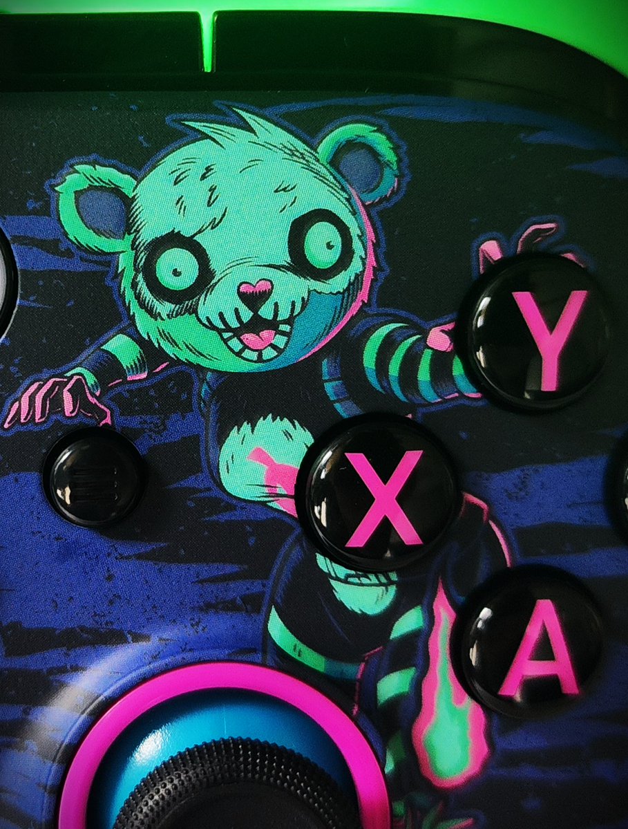 PowerA's tweet photo. Lights out. Controller on. https://t.co/uV4J9SLTVf