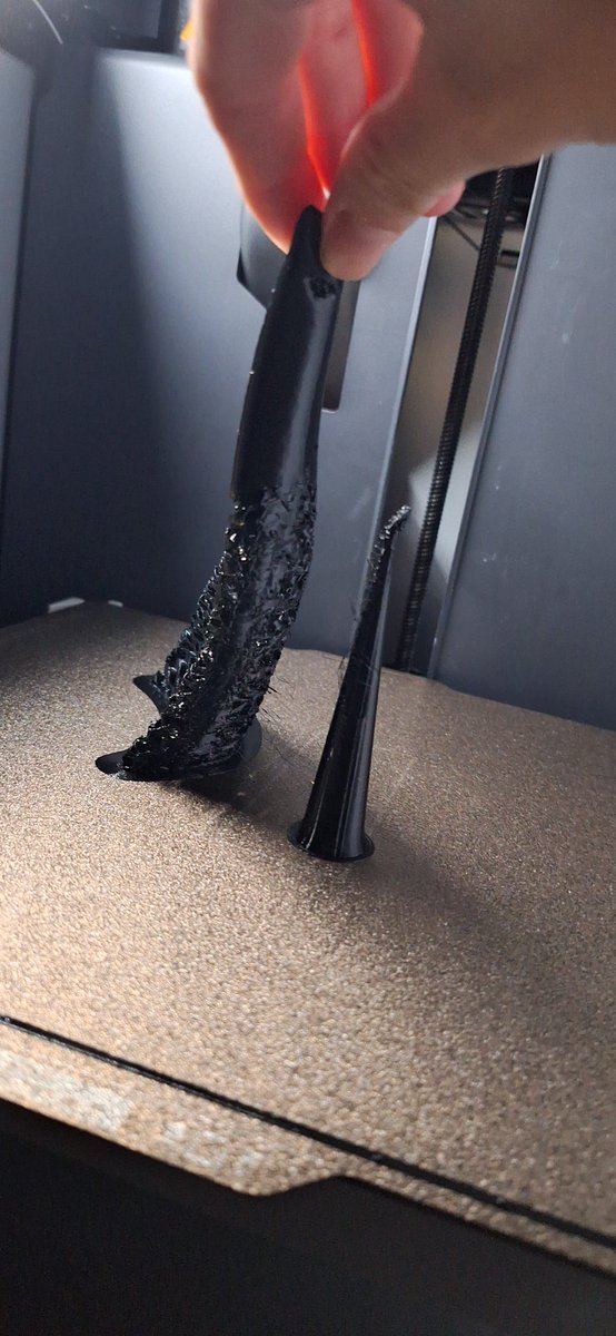 Silverpaww_'s tweet photo. I did it! A perfect TPU print with detachable supports! Gonna reprint the other one, fuck those 20g of filament. Those settings are the key 🤌 (Next test tmw: the thicker base of the ear) #3dprinting #tpu #bambulab https://t.co/aGOjFAMmsY
