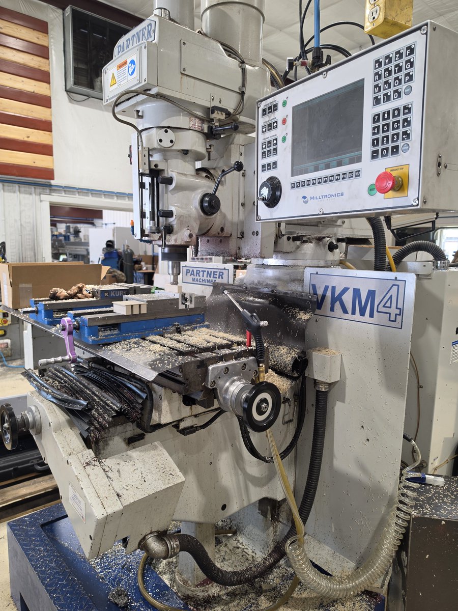 Vlach95's tweet photo. Milltronics VK4 CNC mill. The absolute best option a hobbyist machinist could have in their garage.   Cross between a Bridgeport and a VMC. Easy to use conversational programming, and a wide open space around the table. https://t.co/9mVpk2uUZs