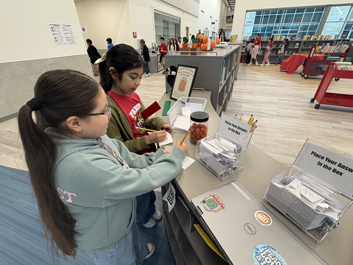 ngonzalezperez's tweet photo. @MandiKMartinez @ES_Farine @IrvingISD @IrvingLibraries Our Falcons also took to writing their estimate of pumpkins 🎃 inside the container! There’s quite a bit of votes! 🗳️ https://t.co/ax8YUtsVHh