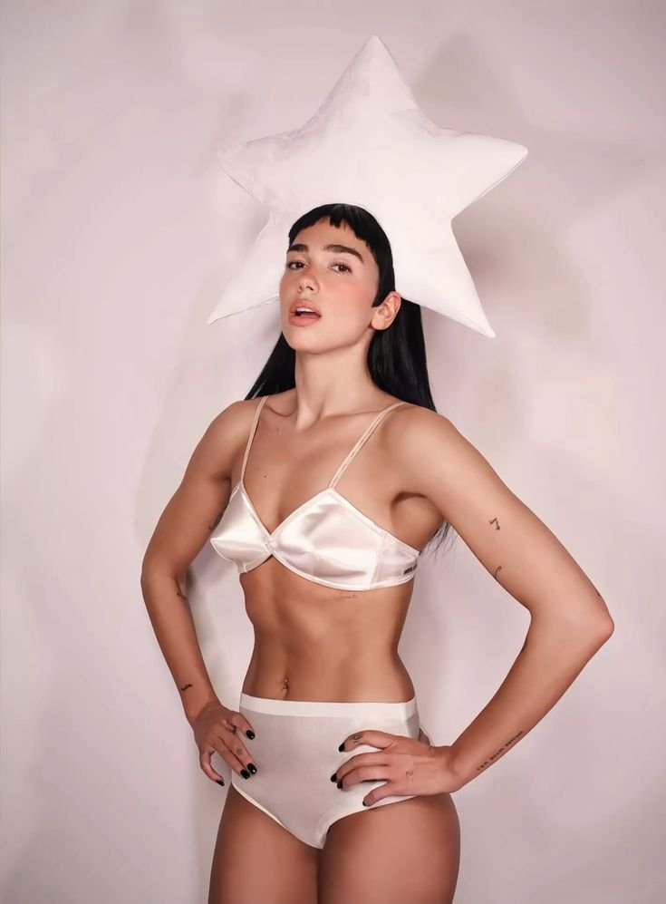sarah_7310's tweet photo. Dua Lipa Transformation into her 30s as a literal global icon, she really is serving ultimate main character energy.

In 20                          In 30 https://t.co/jMdiMeR6zD