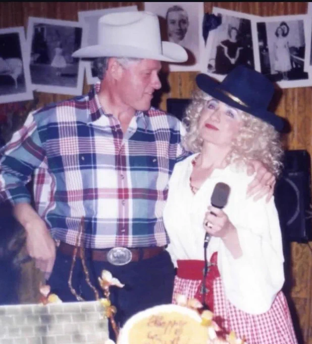 An image of President Bill Clinton and First Lady Hillary Clinton, dressed up as cowboys, at Hillary's Halloween birthday party at the White House.