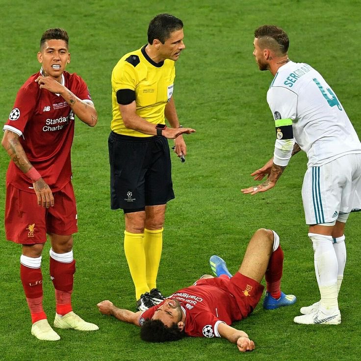 RealityLfc's tweet photo. Mohammed Salah reveals whst Jurgen Klopp told him after his injury against Real Madrid in 2018 champions league finals.

🗣️“I think this is one the saddest day I will never forget in my career after not participating in this special champion league final, I get emotional anytime I see something from that game.”

So it was the 30th minute of the game when I challenge the ball with Ramos on a 50/50 challenge and I won it but he look to not let go of it.”

He hold on to my hand and force me to the ground with my arm in his armpit that cause me the injury, My shoulder was dislocated and I cried severely cried because it was over with me.”

I walk up to Jurgen with tears flowing in my eyes, he hug me And I can see how painful and broken he is in the eyes.

“And then he said, I know this is going to hurt us all tonight because you’re a big part of this team but it’s whatever it is. 

And really push me to go for it, even after that dramatic loss it cause us in 2018 we get back ready and go get it done for ourselves because he deserved to.”

Klopp reminded me these, after we won it in 2019 and said dreams come true when you work towards it.”

“looking back at them feels like yesterday, I’m happy because we had a great team that fights every minute of a game.”