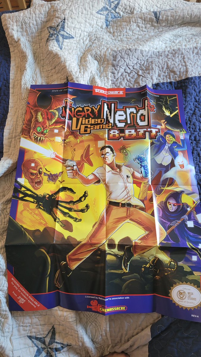 Floofy_master24's tweet photo. (1/2) Finally I got my limited edition Angry Video Game Nerd 8-Bit blue cartridge from @Retroware! Absolutely love the packaging and the box art and poster arts even the awesome art by @RoboticSteve! 

This is something digital games will never replace, physical magic forever! https://t.co/xZP7RqSpRB