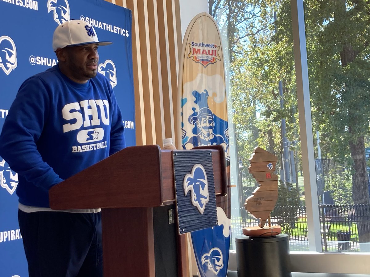 NJHoopsHaven's tweet photo. Seton Hall media day - Boardwalk Trophy on display along with a surfboard from
Maui. https://t.co/ywmucXEO7j