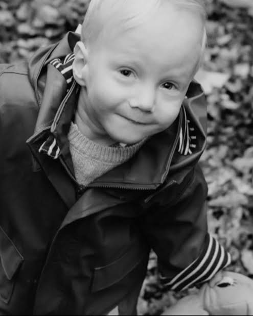 AllForProgress_'s tweet photo. This adorable little fellow's name was Finlay Roberts.

He was 2 years and 11 months old when, in July 2024, his mother, Liz, took him to the Whittington Hospital in north London with a stomach ache. 

He spent 9 hours in the emergency department, most of it in a corridor. There was no cubicle, so she sat on a chair in a public area, took off his nappy in full view of everyone and gave him a suppository, because there was no other way to give it. At about 1am they were sent home. A few hours later she found him not breathing in the bed beside hers. He had a twisted bowel, a rare condition and a recognised one, and in 9 hours at a hospital he had been given 1 partial set of observations.

The senior coroner for inner north London, Mary Hassell, recorded that the absence of serial nursing observations was "a fundamental omission" from his care, that the medical staff had not noticed it was missing, and that the right care that night "would have given him a chance." On June 20th 2025 she sent a Prevention of Future Deaths report to the Whittington, the Royal College of Paediatrics and Child Health, the Royal College of Emergency Medicine and the Royal College of Nursing, warning that a lack of observations "may be a much wider issue than is recognised."

It was. This week ITV published a snapshot taken across 165 emergency departments in March 2025 by the Trainee Emergency Research Network: in the specialist children's A&Es, almost 7% of children were treated in a waiting room, the back of an ambulance or a corridor. Across every department that sees children, 15% of those admitted were treated in such places. Hundreds of children a month. Thousands a year.

NHS England's response to that figure was that the survey "is over 18 months old, and bears little resemblance to what is happening in the NHS today." The coroner's report is 16 months old. Finlay has been dead for 27.

On Sunday the Health Secretary apologised to Liz and David Roberts on television, on behalf of the NHS, and said she had asked the chief executive of NHS England to draw up new standards for children's A&E care, including a plan to eliminate corridor care for children. She also acknowledged that children in corridors are not being properly counted, and that measures to count them were introduced this summer. So the sequence runs: a child dies in a corridor; a coroner writes to 4 institutions a year later; a year after that, the state begins counting; a year after that, it asks for a plan. The Whittington, for its part, says that when demand exceeds capacity patients "may receive care in temporary clinical areas, including corridor spaces", which is the sentence you write when the corridor has become a department.

The apology was sincere. The plan will be sincere. Neither will say why the corridor exists: Britain has 2.35 hospital beds per 1,000 people. Portugal has 3.51. Germany has 7.82. Over 30 years the number of overnight beds in England has been cut in half, by decision, on the theory that a bed is a cost rather than a place to put a sick child while someone checks on him every hour. The corridor is the theory's output, and a plan to abolish corridors that leaves the theory standing will produce a corridor with a different name.

Progress will set a statutory minimum of 120,000 general and acute beds in NHS England, up from 105,000 today, delivered within the first Parliament, with 3,000 of them back in service within 12 months from wards that are mothballed now. And within 90 days of Royal Assent, NHS England will issue binding guidance that corridor care is not an acceptable standard of care under any circumstances, with every trust that resorts to it required to report it immediately. A rule with a bed behind it. The one without the bed is a press release.

Liz Roberts gave her son his medicine on a chair in a corridor because the country had decided, decades before he was born, not to have a room for him. We intend to build the room. Join us.