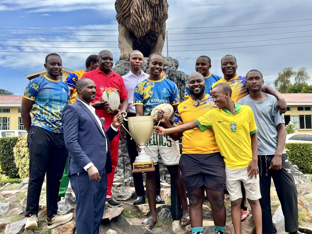 HeathensRFC's tweet photo. We went to Mbarara to share a little rugby knowledge. Couldn't leave without showing them what success looks like, could we? 🏆😏💛💙

#HeathensTuko || #Yamaanyi https://t.co/QXEMCGhlqc