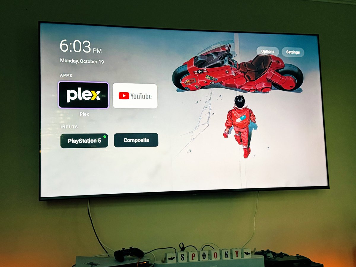 akirathedon's tweet photo. I threw my TV out the window of my second-story apartment in 2003. After that I used a projector to watch movies and play games.

Recently I returned to TV Land and bought this big-ass 85-inch thing to watch my Plex collection and play games on...

To my disgust it was absolutely full of bloat and horror: row upon row of things I didn't want to see, endless nonsense about promiscuous teens and gambling and lesbian witches, every manner of foul anti-human normgloid corposlop pumping into my hallowed space... 

So I spent hours going through the menus, trying to see if I could switch things off. Eventually it turned out that there was a limit to this and I was to remain under assault from an unending barrage of absolute horror.

Also the whole thing was laggy and clunky. Utterly miserable. 

Fast forward to October 2026. Last night I had a conversation with one of my robot assistants and after pasting a few things into terminal, I have now removed EVERYTHING from this machine that I bought that I do not want.

All that remains are the two apps I use, and a slick interface with revolving wallpapers drawn from movies in my collection that I have given 5 stars. It is fast as fuck.

I Love Living In The Future ❤️