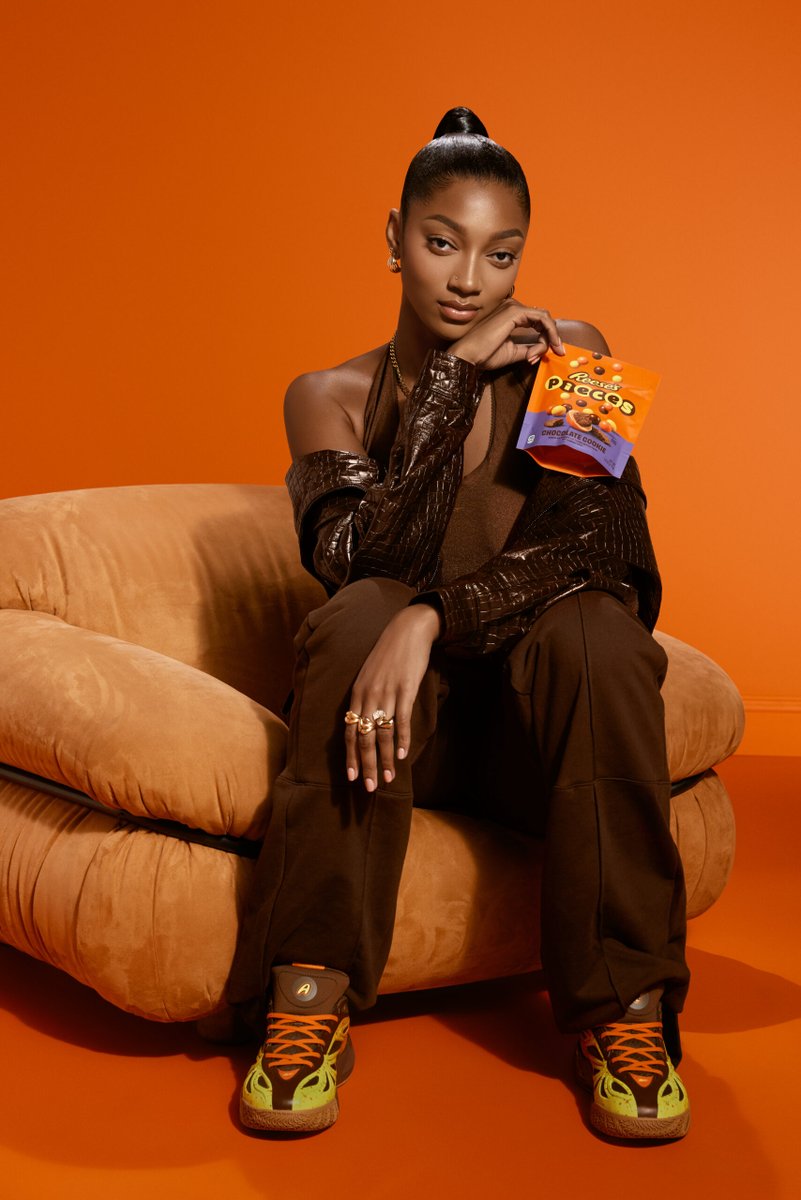NickDePaula's tweet photo. Angel Reese is launching the "Reese's" Reebok Angel 1s tomorrow, an official collab with @Reeses, with a theme inspired by the iconic candy. 

"We designed this colorway especially for my fans, for the Reese’s Pieces!" says @Reese10Angel https://t.co/n8yfzsrRXF