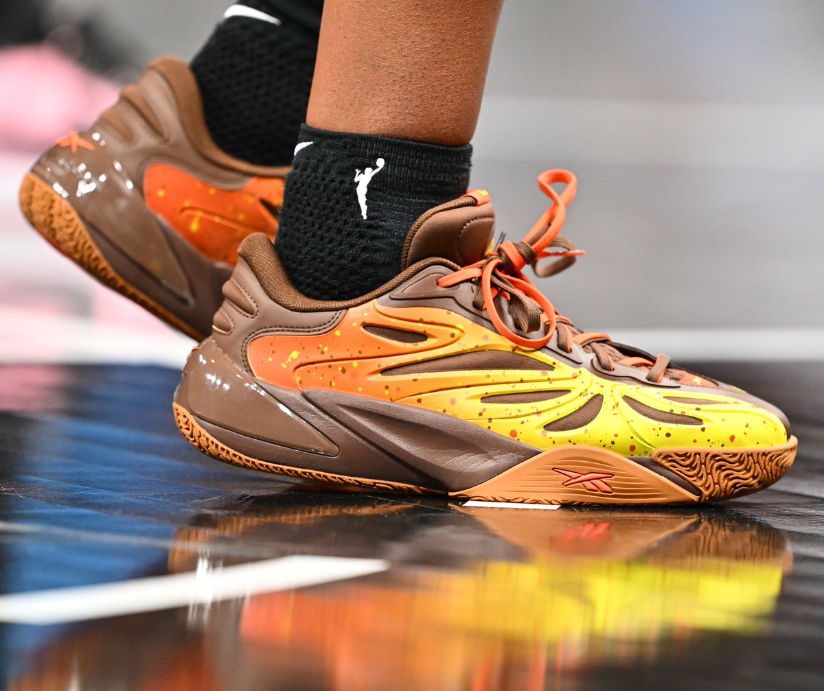 NickDePaula's tweet photo. Angel Reese is launching the "Reese's" Reebok Angel 1s tomorrow, an official collab with @Reeses, with a theme inspired by the iconic candy. 

"We designed this colorway especially for my fans, for the Reese’s Pieces!" says @Reese10Angel https://t.co/n8yfzsrRXF