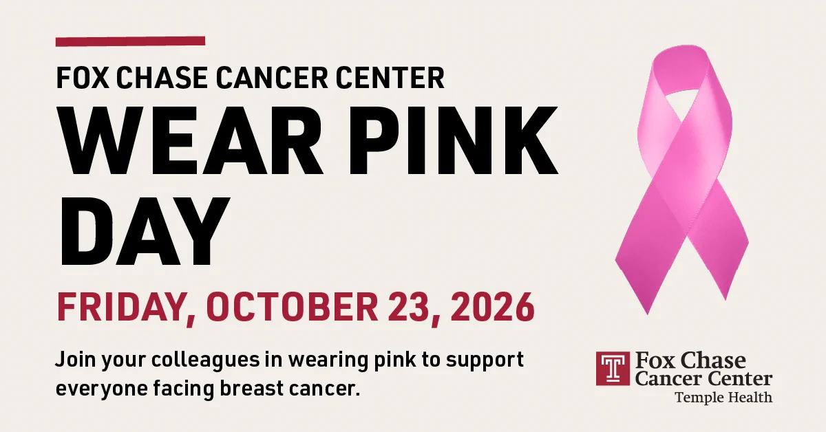 Text promoting "Wear Pink Day" for Fox Chase Cancer Center on Friday, October 23, 2026. There is a pink ribbon graphic on the right. The text encourages joining colleagues in wearing pink to support those facing breast cancer. Fox Chase Cancer Center’s logo is at the bottom right.