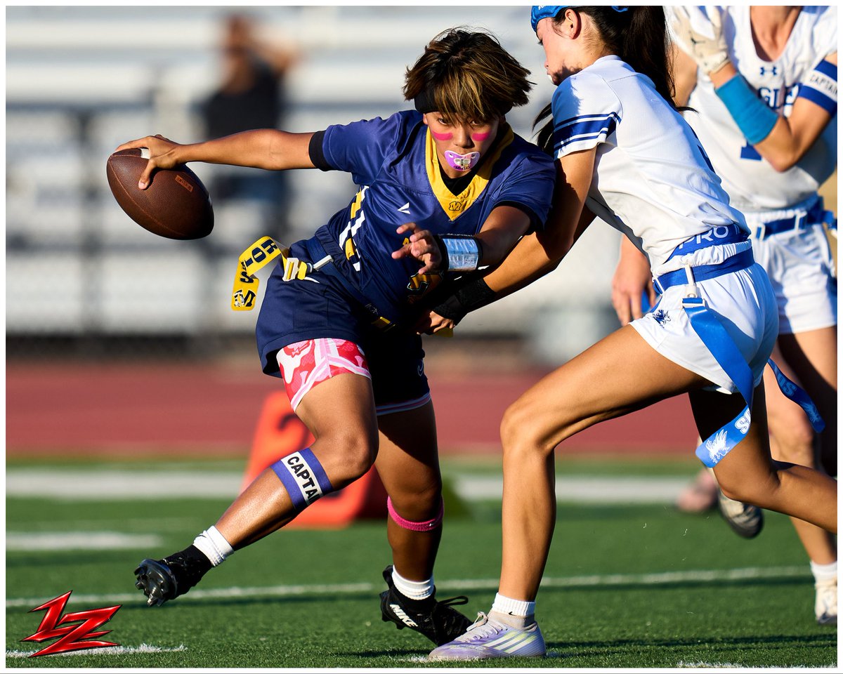 Legndz's tweet photo. Milpitas quarterback Bren David (2) evades a flag pull by a Los Altos defender during a high school girls flag football game at Milpitas High School in Milpitas, Calif., on Wednesday, Oct. 7, 2026. Milpitas defeated Los Altos 6-0. (Photo by Larry Kauk/Legndz Photography) https://t.co/CsOncctEz2