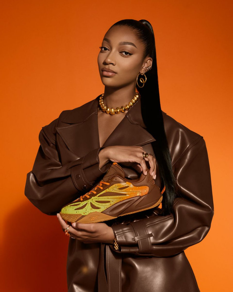 footlocker's tweet photo. Meet the Reese’s Pieces-inspired Angel Reese 1 🍫🥜

Available now at Foot Locker. https://t.co/KKl5EwhGAB