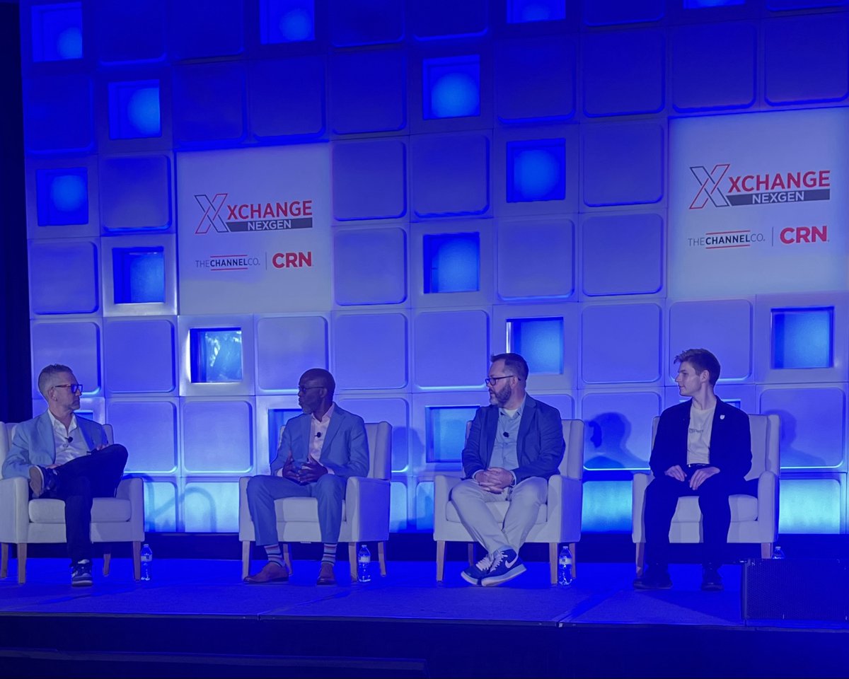 TheChannelCo's tweet photo. 🎤 We’re back on the main stage at #XChange NexGen!

Paco Lebron, Founder & CEO of ProdigyTeks, shared “My MSP Story: Building an MSP, a Community, and a Legacy,” including his journey building ProdigyTeks and MSP Unplugged.

Now, Jason Myers of OpenText Cybersecurity is joined by Nathan Ostrowski of Petra Security, Danny Perry of ITCubed and Brian Ruschman of C-Forward, Inc. for “AI Escaped the Lab and Showed Up at the Help Desk.”

The AI conversation continues, this time from the MSP front lines. 👏