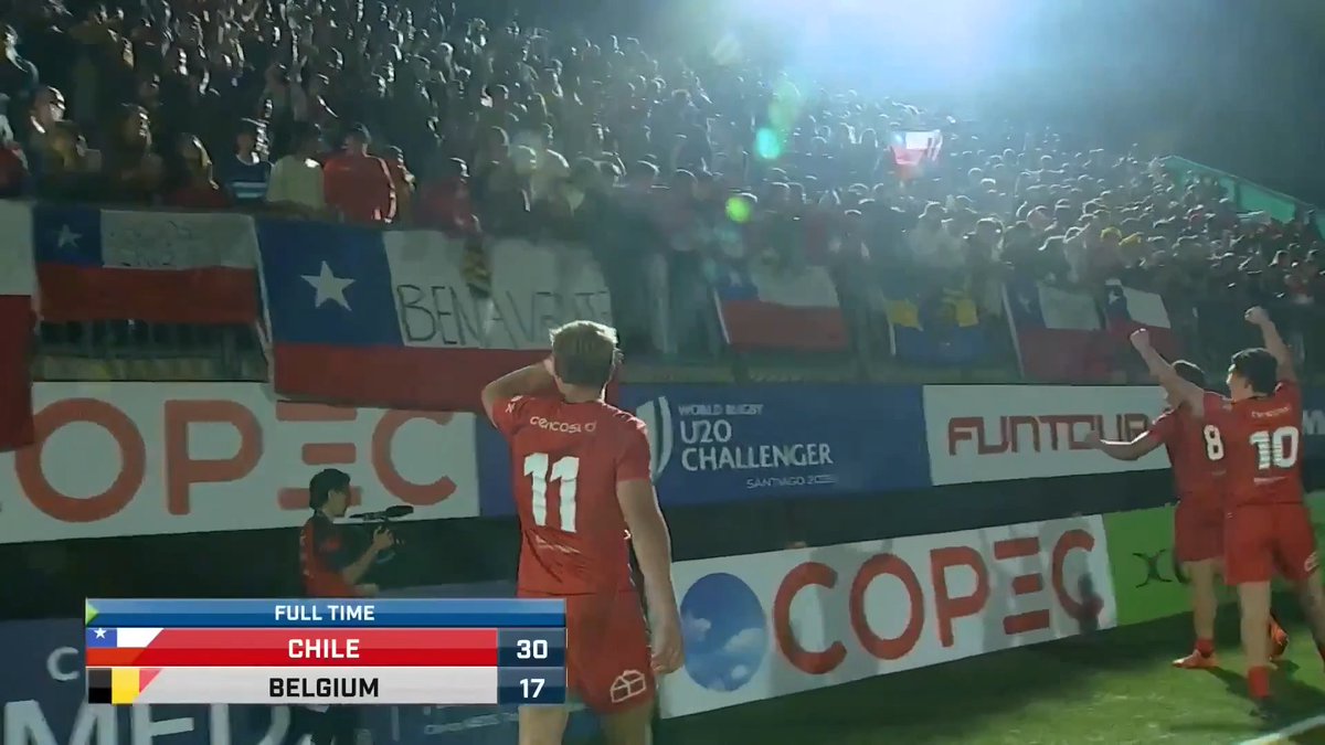 T2Rugby's tweet photo. Amazing scene in 🇨🇱 Chile who packed their stadium to watch their U20s beat 🇧🇪 Belgium 30-17 (who had beaten both Portugal & Canada so good result for Chile). Plenty seem to wear Condores merchandise with dads bringing their kids in Chile shirts playing with a ball. All this is great stuff all round for the future of Chilean rugby.