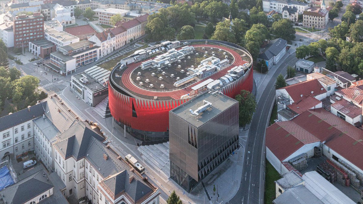 dezeen's tweet photo. Seven striking buildings that make a statement with red: https://t.co/Er1S4lJ8nd https://t.co/xEn2e2UXF9