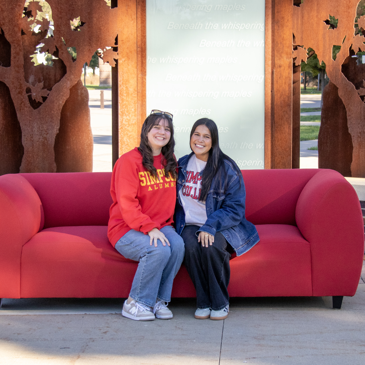 SimpsonCollege's tweet photo. A Homecoming tradition worth sitting down for! From friends to alumni, the red couch brings Storms together year after year. ❤️💛 https://t.co/8m6rRi7OEu