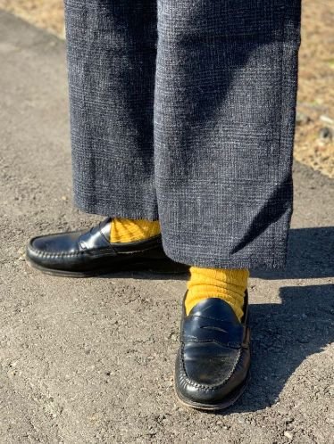 cavafyism's tweet photo. When wearing muggle outfits, Kingsley always wears colourful socks (even if the rest of his outfit is monochrome). This is canon because I said so https://t.co/FA5zc2TCvG