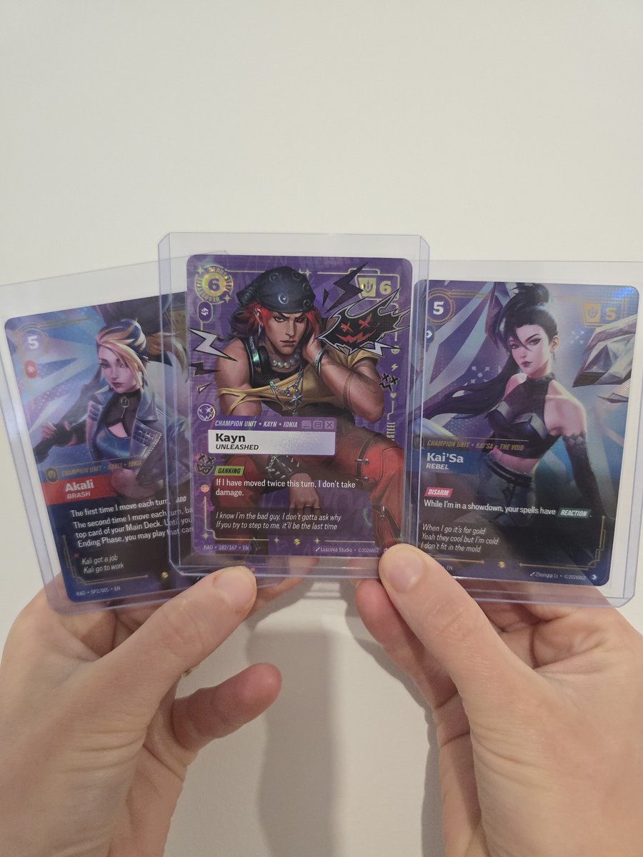 Loxely's tweet photo. @playriftbound Got very lucky with 3 K/DA SPs. And my wife pulled the Heartsteel Kayn ON 😍 https://t.co/vIHsKxOiJq