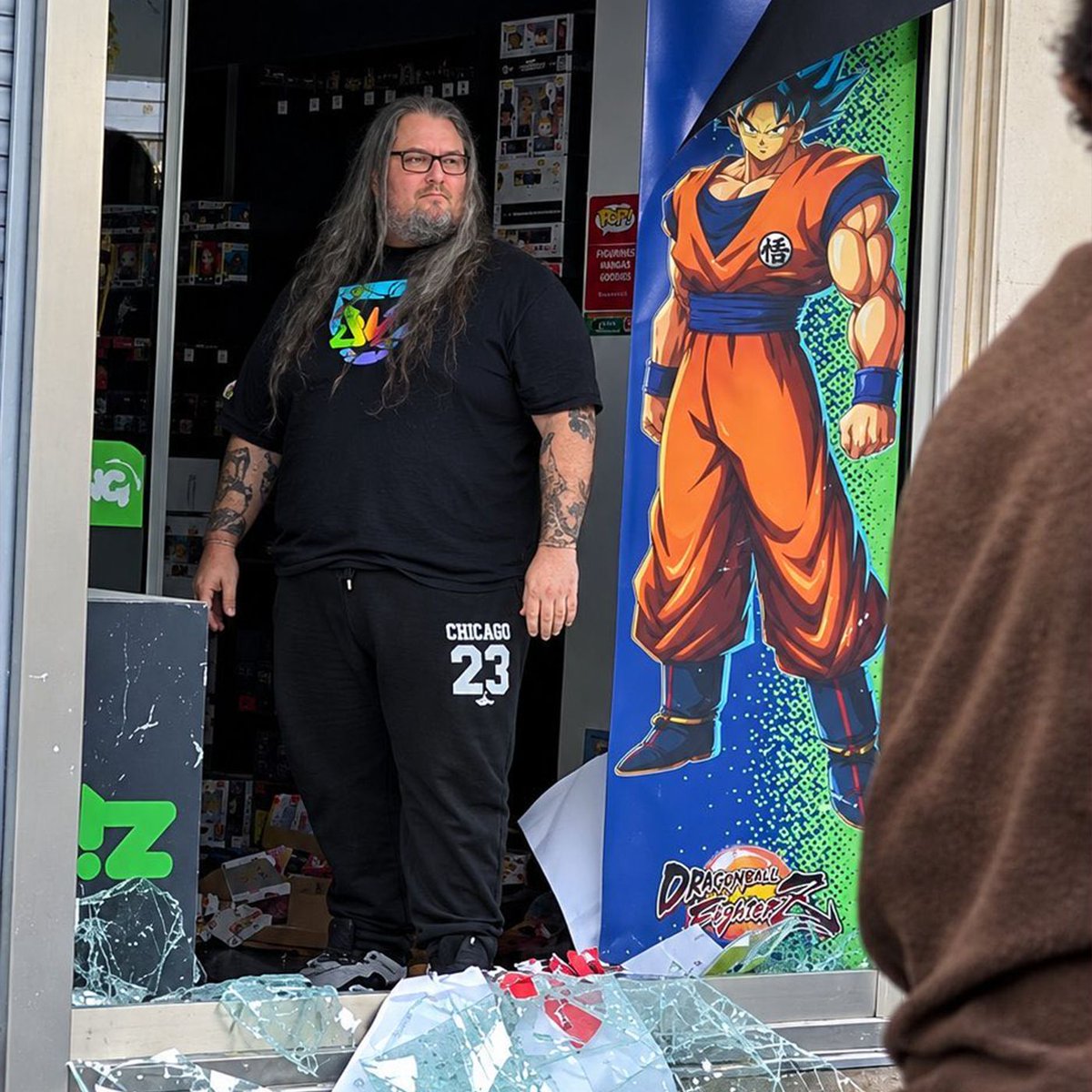 Dexerto's tweet photo. A video game store manager has gone viral for standing up to vandals during riots in France

He was seen defending his shop before being knocked to the ground https://t.co/wTesJnAZFf
