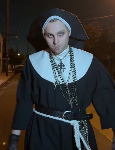 calmcabin's tweet photo. i hope whoever stole my package was also planning to be nun luke hemmings for halloween https://t.co/f1o9qExZNB