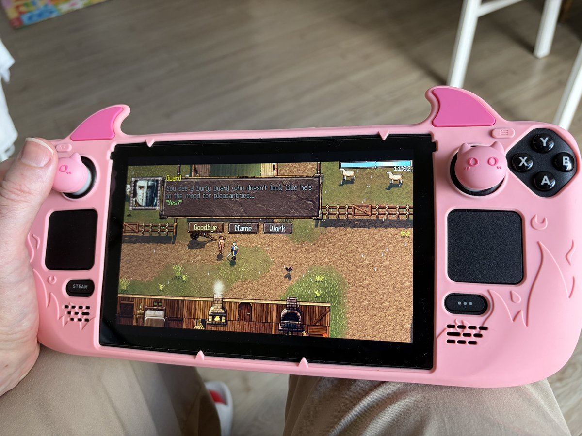 CodeofTheSavage's tweet photo. Went out and bought myself a second hand steam deck complete with a pink kitty cat cover (bonus!) - for testing CoTS on the deck. Awesome! I never thought I would be playing code of the savage on a handheld device. 🌸 https://t.co/uo3mBgVjeR