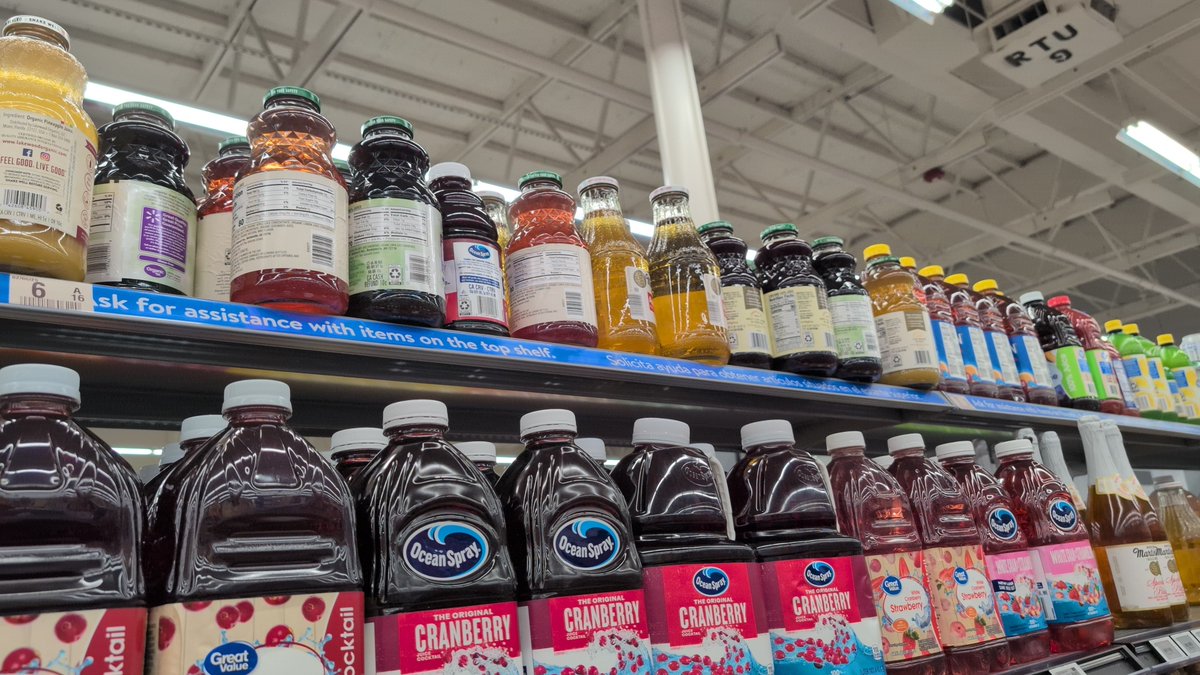 gorpgames's tweet photo. glass bottle of juice fell off top stock and hit me in the head while i was adjusting shelves because some idiot left a bunch of bottles hanging half off https://t.co/HrgzC0C6R3