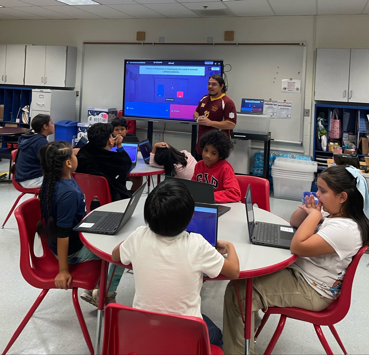 GloriaJCSL's tweet photo. Today’s Pokémon TCG Club started with a Kahoot game created by our counselor, who leads this club, that reviewed concepts our trainers have learned thus far. #criticalthinking #sportmanship #creativity @HHESHUSKIES @csconnectmcps https://t.co/2LubmVECdD