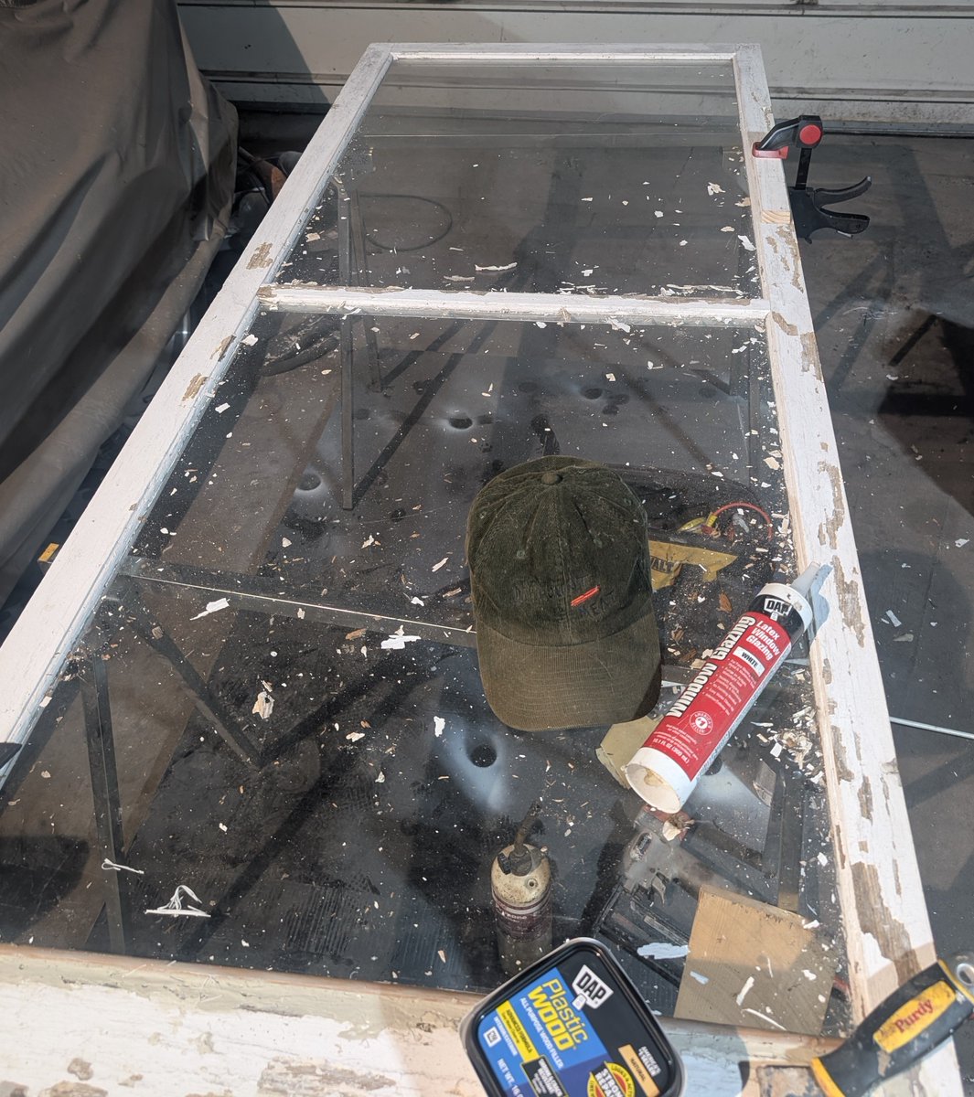 orb010's tweet photo. Old man winter is on his way. 

Scrape the lead paint off those old storm windows. 
Hurry and repair the blown out lower sash/ bottom rail cause the glaze needs a week to cure &amp; still have to paint. 
7 more to go. 
Discount meat hat for scale. 
https://t.co/QSWMobV7AU https://t.co/OCr0bsj1me