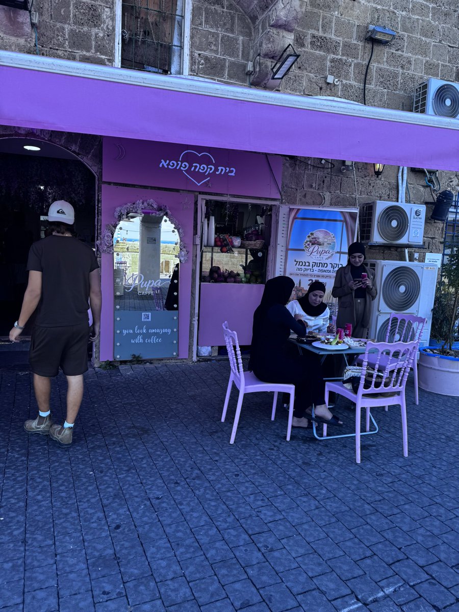 JudeAz07's tweet photo. @Raphfel Here is “apartheid Israel”.  The stupid West.  We tried to warn them.   I am in a cafe in Jaffa sitting next to Arabs.   We live in Israel alongside.   My Israeli friend’s oncologist is Professor Wahid.  In Israel. https://t.co/cZts4DNZT5