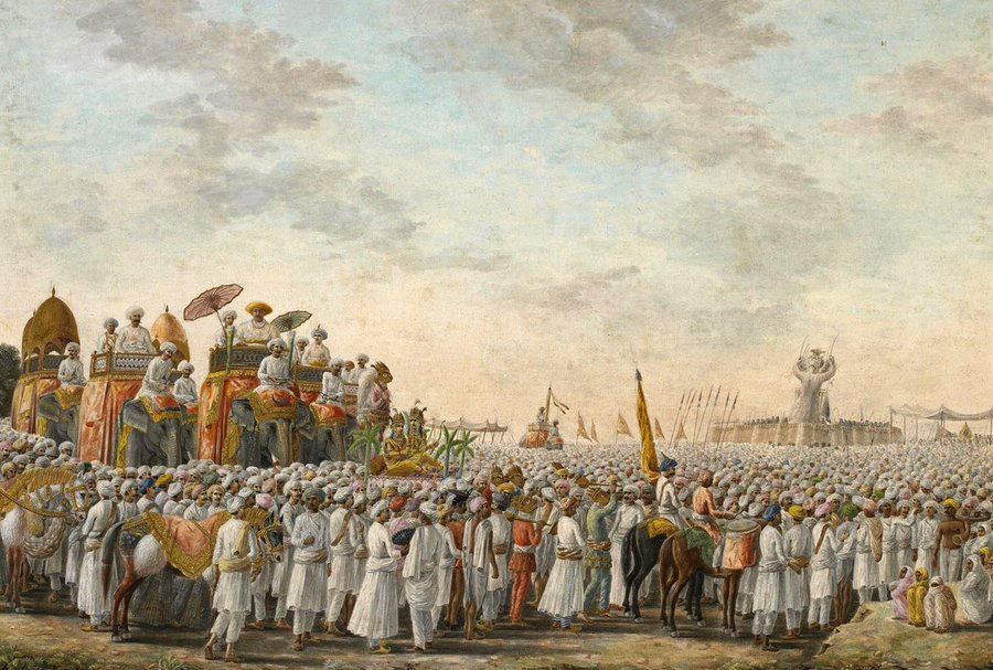 sanjeevsinghx's tweet photo. This Sewak Ram’s 1826 "Dussehra Procession at Patna" painting captures just how remarkable men’s drip in Bihar once was. Flowing angarkhas, kurtas, wrapped dhotis. Look at Babu Kunwar Singh and his attendants in the Illustrated London News in 1857... Such presence, such effortless elegance. 

That world of everyday dressing now feels almost lost. In my village, my uncle is the only man who still wears a kurta dhoti. He’ll probably be the last.