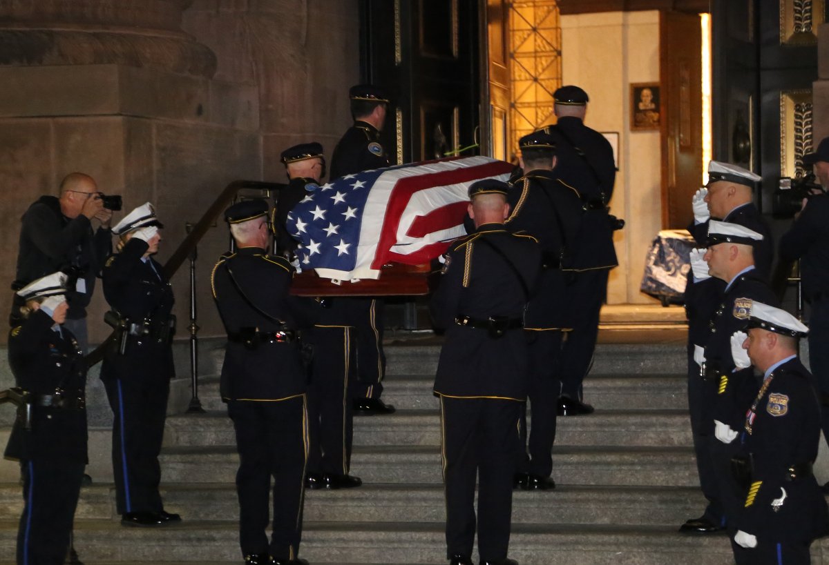 FD4D's tweet photo. Slain Police Officer Shane Seiber arrives at the Cathedral Basilica of Saints Peter and Paul where his funeral will be held later today.  Police Officer Shane Seiber, 40. He is remembered by his wife, Lisa, and their two children, Finn and Emily.  Seiber, a 10-year veteran officer, was shot and killed in West Philadelphia after responding to a report of a man with a gun. @PhillyFireNews @PhillyPolice @FBIPhiladelphia @PhillyInquirer @NBCPhiladelphia @ABCPhiladelphia @cnnbrk @AP