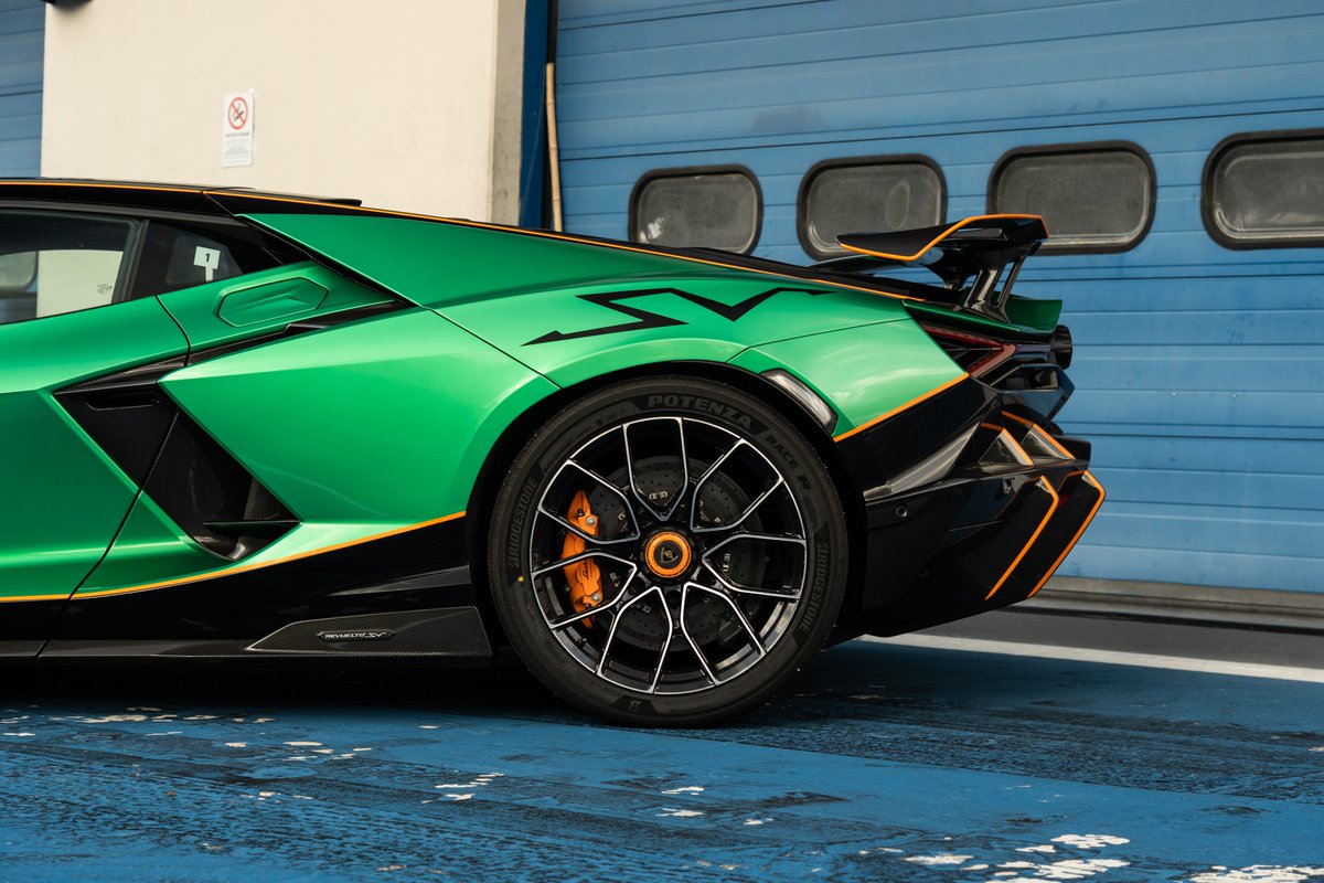 Tim_Stevens's tweet photo. It's utterly bonkers in the way you want a dialed-up Lambo special edition to be, yet surprisingly manageable. Big upgrades to the brakes, suspension, and aero made me comfortable pushing and sliding through the turns at the twisty and tricky Autodromo Vallelunga outside Rome. https://t.co/eglNIMjNvn