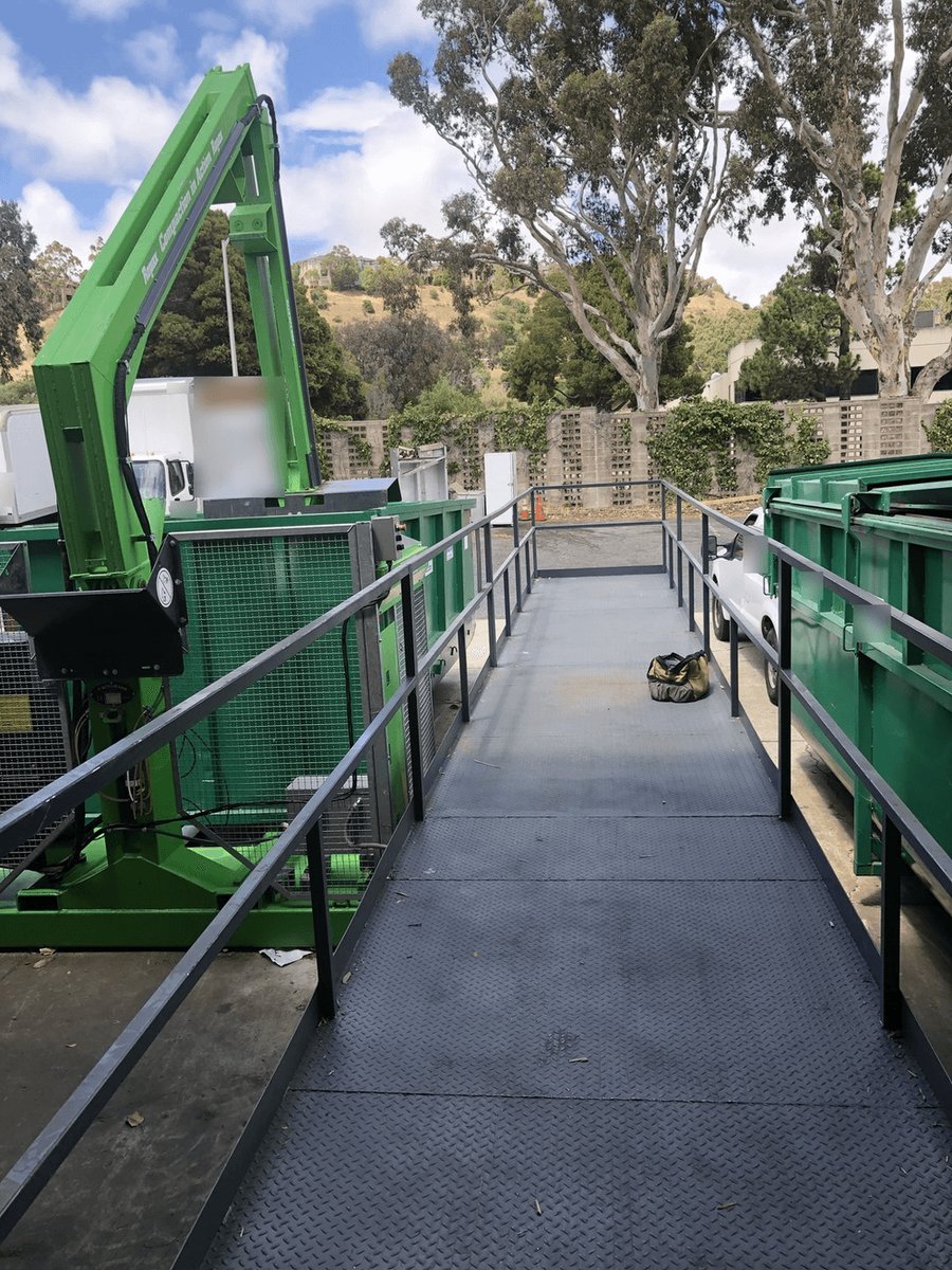 xCaliStyle's tweet photo. New compactor install with a full-length access ramp. Diamond-plate decking and guardrails on both sides for safe, easy access.
Caption SI-created (SI = super intelligence).
#IndustrialCrew #Compactor #SafetyFirst #Recycling https://t.co/US7KaDdamr