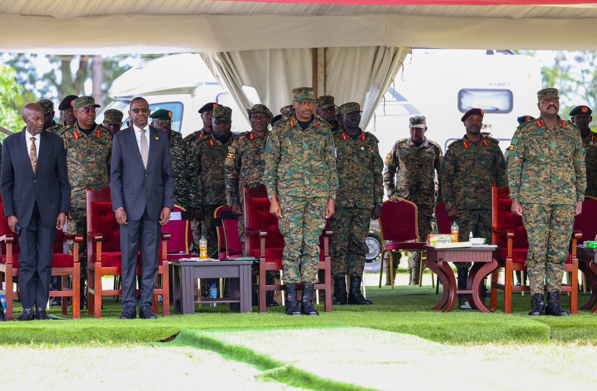StateHouseUg's tweet photo. The Minister of Defence and Veteran Affairs, Hon. @KiryowaKk, commended President @KagutaMuseveni's commitment to building a professional, disciplined, and modern @MODVA_UPDF. He highlighted regional cooperation in military training and urged the newly commissioned officers to lead with integrity, discipline, and a commitment to serving Uganda.