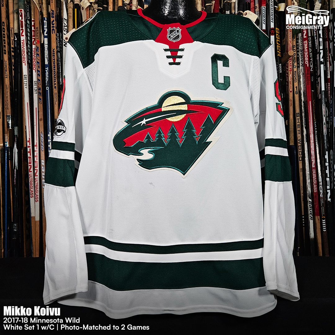 MeiGray's tweet photo. A Minnesota Wild legend  🏒 

Take a look at this White Set 1 w/C jersey worn by Mikko Koivu during the 2017-18 season. The jersey has been photo-matched to two games: against the Washington Capitals on Nov. 18, when he recorded an assist, and the Buffalo Sabres on Nov. 22, when he added two more. 📅

Koivu finished the season with 45 points (14 G, 31 A) in 82 games. He played 15 of his 16 NHL seasons with Minnesota and recorded 709 of his 711 career points with the Wild, making him the franchise’s all-time leading scorer. 🌟

The team retired his No. 9 on March 13, 2022, making him the first player in franchise history to receive the honor. This jersey is available on consignment at https://t.co/pxFg2et84Y. 🖥️

🔗:https://t.co/z1J6bk1oAo