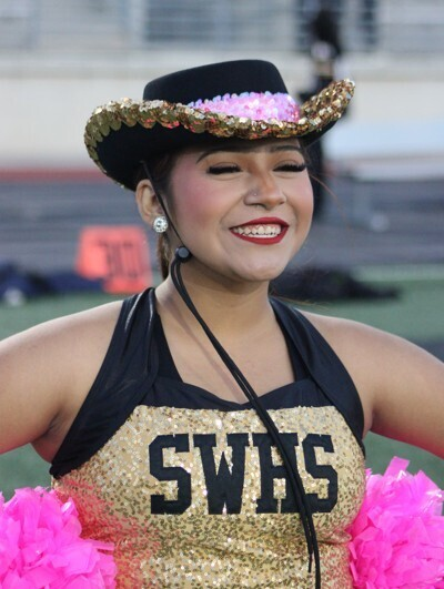 SpringWoodsHigh's tweet photo. 12th grade yearbook photographer Oscar Arroyo took these candid photos at the last SWHS varsity football game. You will see many of his photos in this year's yearbook! Please order one today at https://t.co/YOGczUTtbv! https://t.co/XevFtPoX6U