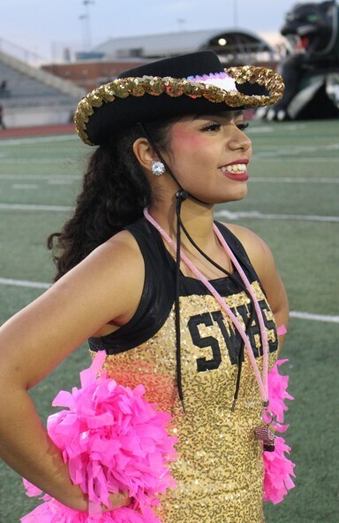 SpringWoodsHigh's tweet photo. 12th grade yearbook photographer Edgar Sanchez Roque took these photos of the SWHS Tigerettes and Color Guard at the last varsity football game. You will see his photos in the yearbook! Please order yours now at https://t.co/YOGczUTtbv! https://t.co/xciVde4SRa